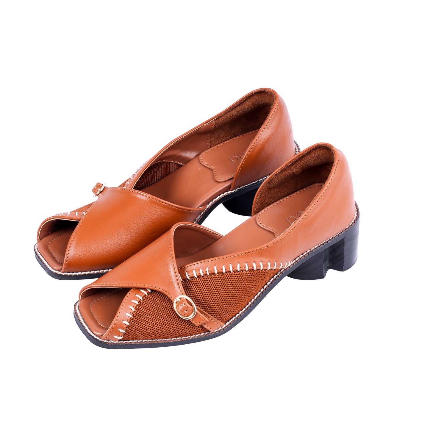 Pair of Tan open-toe shoes on a white background
