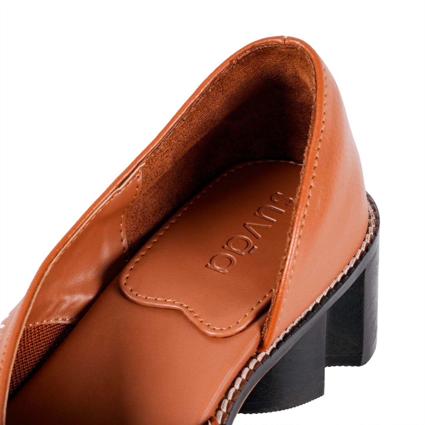 Brown shoe with 'Suvāa' branding on a white background