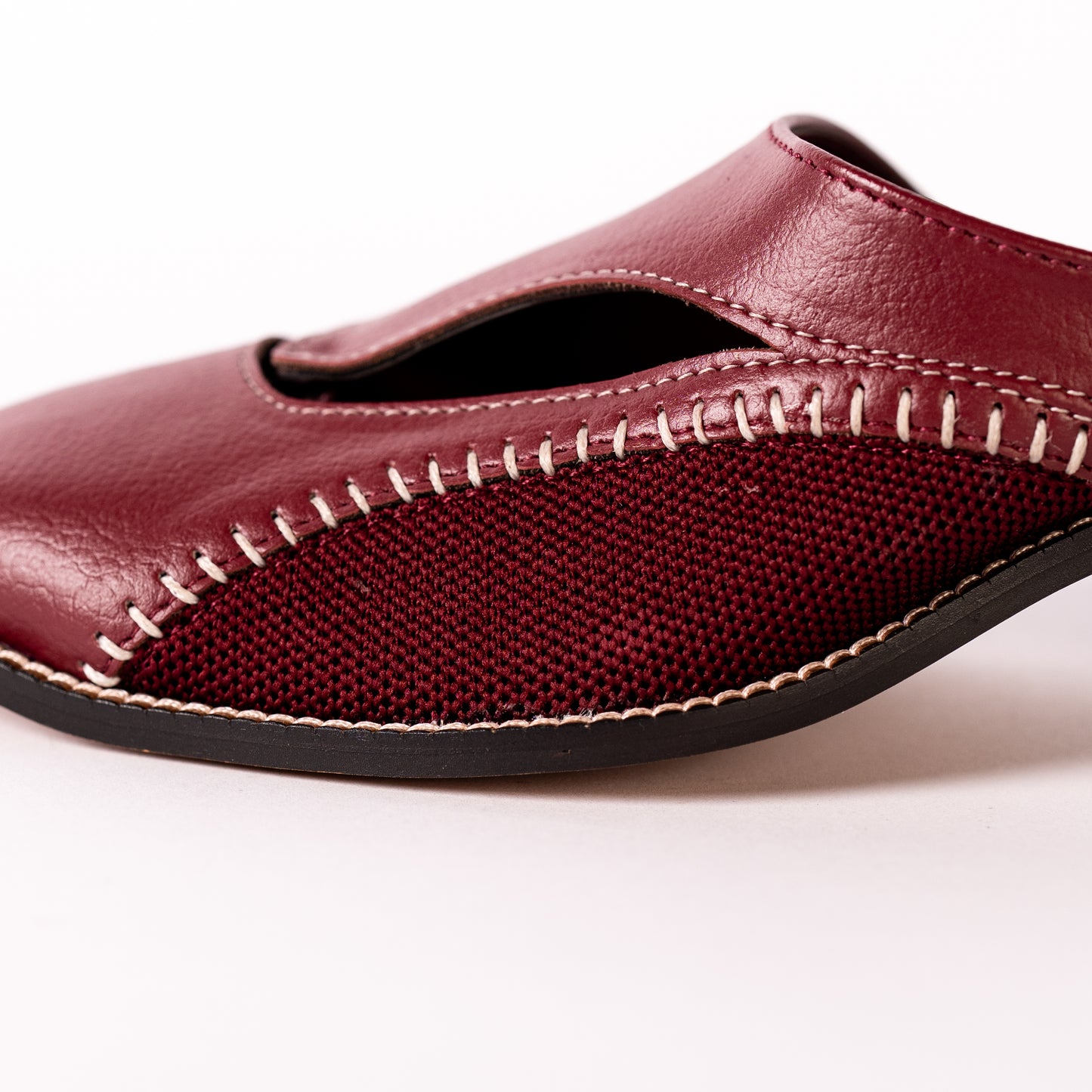 Burgundy shoe on a white background